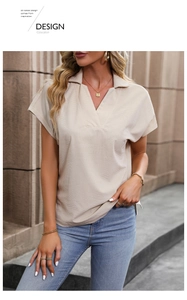Detail of waffle textured beige short sleeve polo shirt with elegant V-neckline for women