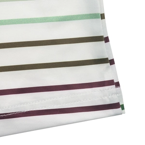 Detail view of the colorful striped pattern and flat seam stitching on a long sleeve tee