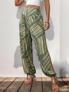 Pantalon bohème taille haute à jambes larges fendues avec imprimé géométrique vert