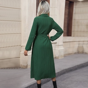 Dark green pleated long sleeve shirt dress with collar and waist belt back view