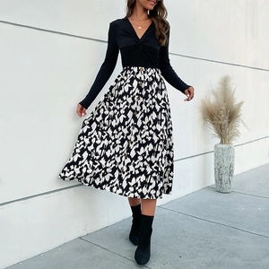 Robe midi femme deux pièces avec haut noir col en V et jupe boutonnée imprimé léopard