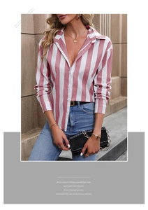 Detail of pink and white striped shirt with button-down front and classic collar