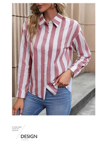 Detail of pink and white vertical striped shirt with white buttons and classic lapel collar
