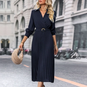 Detail of navy blue pleated midi dress with V-neckline and elegant metal buckle belt