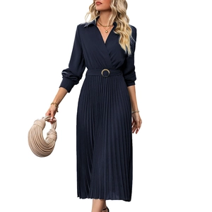 Detail of navy blue pleated maxi dress with lapel V-neckline and matching buckle belt