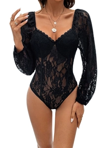 Detail of black lace bodysuit featuring heart-shaped neckline and sheer puff sleeves