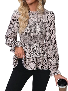 Detail of high collar ruffle neck and leopard print texture on this slim fit blouse
