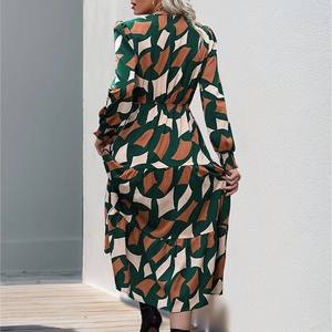 Elegant V-neck long dress with green geometric print and tiered ruffle hemline design