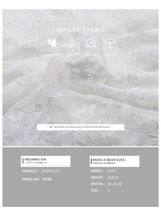 Macro view of white floral lace fabric texture and hollow embroidery detail for bodysuit