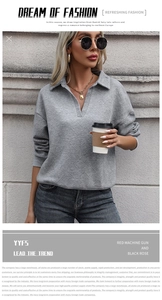 Detail of grey V-neck textured sweatshirt featuring a diamond knit pattern and polo collar