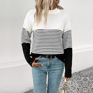 Women's knit sweater with black and white color-blocking and stripes, long sleeve crewneck