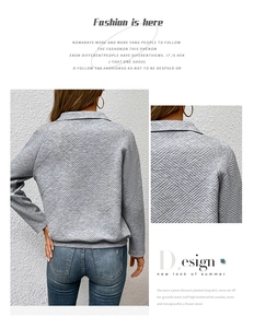 Detailansicht eines grauen gesteppten Polo-Sweatshirts mit geometrischer Textur für Damen