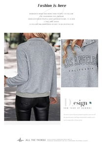 Detail of Los Angeles print on grey quilted sweatshirt with button collar design