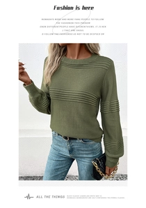Detail of army green ribbed knit sweater with unique textured stripes and crew neckline