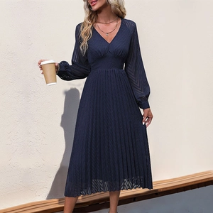 Elegant navy blue V-neck pleated midi dress with long sleeves and dotted texture