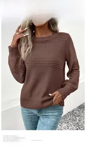 Detail of dark brown knit sweater featuring textured horizontal stripes and round neck design