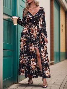 Bohemian V-neck floral maxi dress with long sleeves and high slit in black floral print