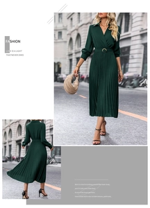 Detail of dark green pleated maxi dress with lapel V-neck and adjustable waist belt