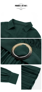 Detail view of lapel collar and waist resin buckle on this dark green pleated maxi dress