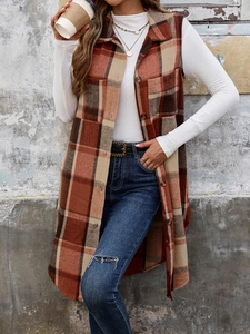 Detail showing the plaid pattern of the sleeveless mid-length cardigan with large pockets