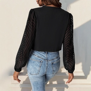 Black V-neck bodysuit with pleated sheer mesh long sleeves and a stylish slim fit