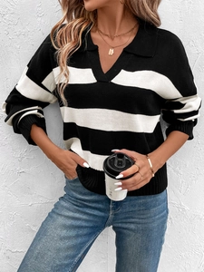 Detailed close-up of a striped knit sweater featuring a classic polo collar and V-neckline