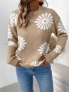 Women's autumn camel knit sweater featuring large white daisy patterns and classic crew neck