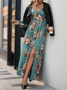 Detail view of floral print maxi dress featuring a high side slit and elegant deep V-neckline