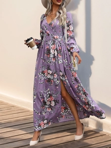 Elegant purple floral V-neck maxi dress with long sleeves and high side slit detail
