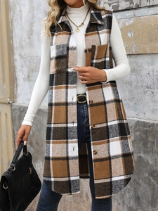 Detail view of a long plaid sleeveless vest with buttons and vintage utility chest pockets