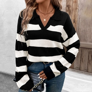 Women's loose black and white striped knit polo sweater with V-neck and collar