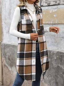 Close-up of vintage brown plaid long vest showing high-quality wool-like texture and details