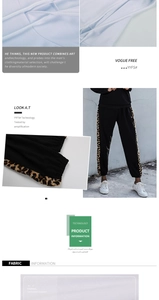 Close-up detail of leopard print side panel and breathable knit fabric on joggers