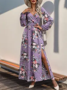 Detailed view of lavender floral dress with side slit and elegant wrap V-neckline