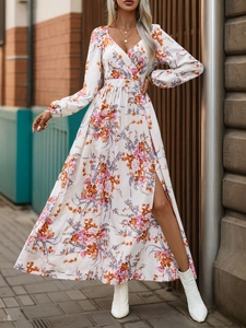 Detail view of floral print maxi dress featuring elegant high side slit and soft fabric