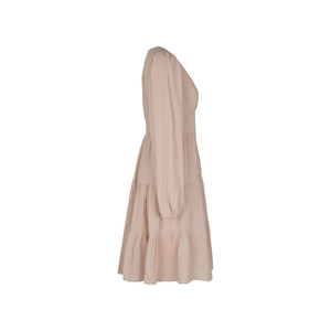 Detail view of pink long-sleeved dress with tiered skirt and button-down front bodice