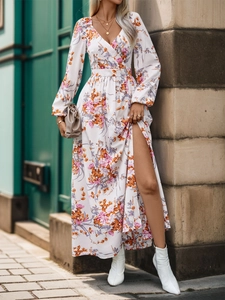 Detailed close-up of V-neck floral wrap dress with high slit and elegant long sleeves