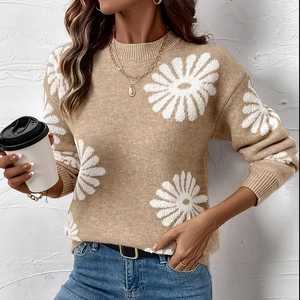 Beige crewneck sweater with white daisy floral patterns and ribbed trims in casual style