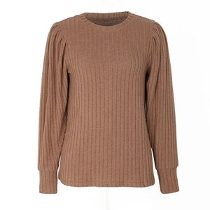 Detail of brown ribbed knit top featuring crew neck and pleated puff long sleeves