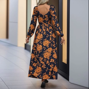 Robe maxi fleurie bleu marine à col en V avec manches lanternes et taille haute