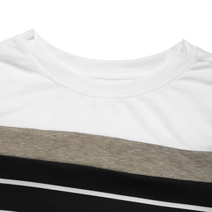 Close-up of color-block striped crewneck tee showing fine double-needle stitching detail