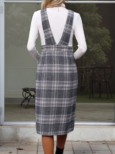 Rear view of casual grey plaid pinafore dress with V-shaped wide straps and high waist