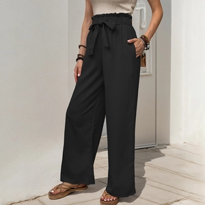 Black high-waisted paperbag trousers with loose fit, elastic waist and tie belt