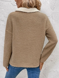 Rear view of cozy beige sherpa fleece jacket with a contrasting white collar and relaxed fit
