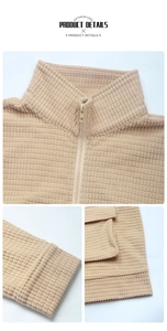 Detail view of waffle texture corduroy jacket with stand collar, zipper and ribbed cuffs