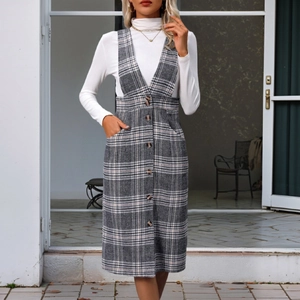 Women's plaid pinafore dress set with white turtleneck top and grey checkered pattern