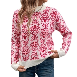 Ivory knit sweater with red floral pattern featuring high neck and ribbed cuffs