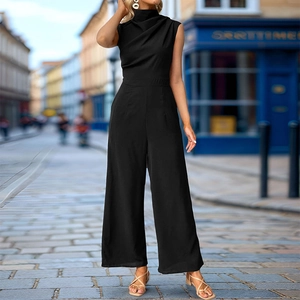 Detail of elegant black sleeveless jumpsuit featuring a draped cowl neck and wide-leg cut