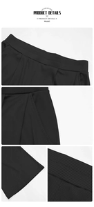 Detail of black ribbed knit pants featuring elastic waist, side pockets, and hem texture