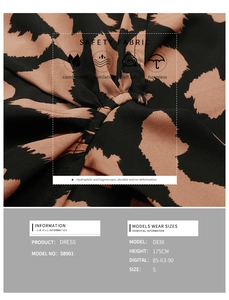 Close-up of leopard print dress fabric showing soft texture and detailed size chart